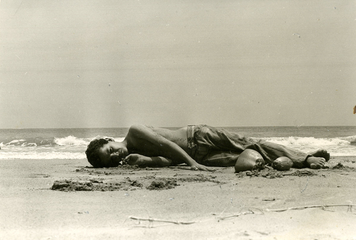 Weiner, Untitled (boy laying on beach near Montauk), c.1950s