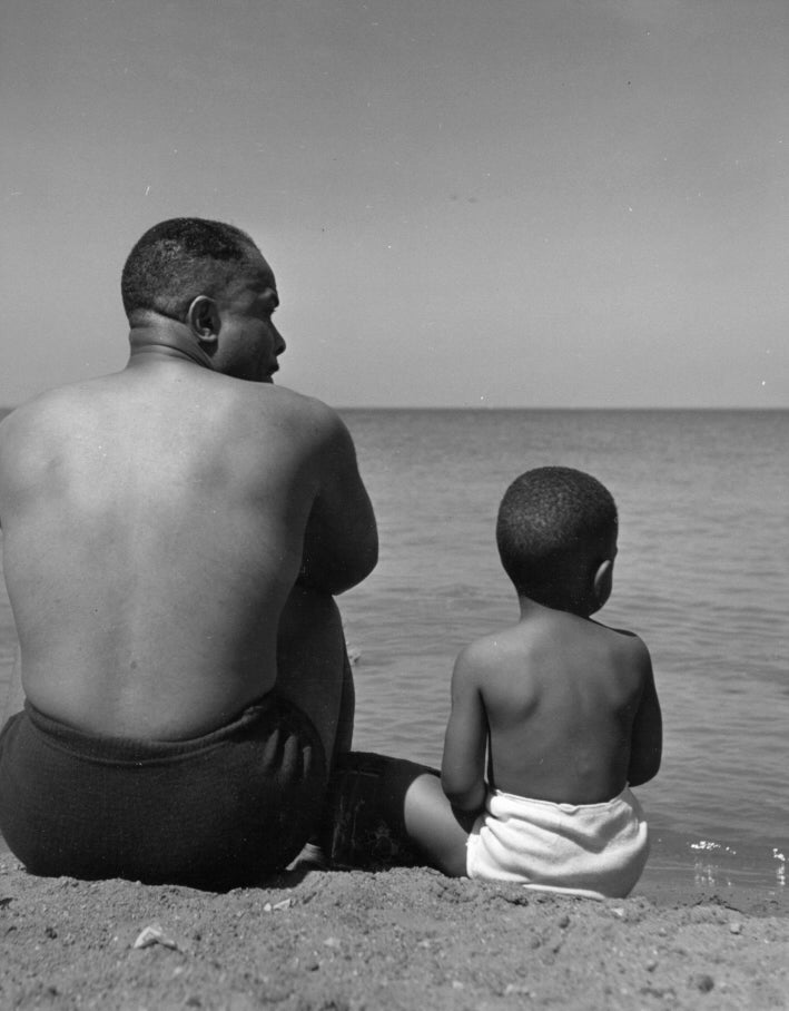 Miller, From "The Way of Life of the Northern Negro," Chicago (Lake Michigan, man and child), May 1947