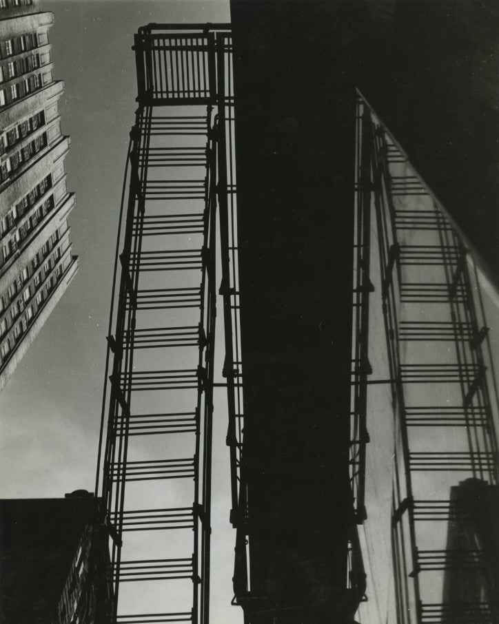 Berko, Chicago "fire escapes, forming a strange pattern of their own, are their only companions", 1948
