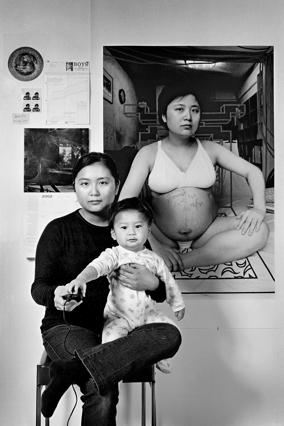 Wang, The Mother as a Creator No. 2: Pressing the camera shutter together, 2002